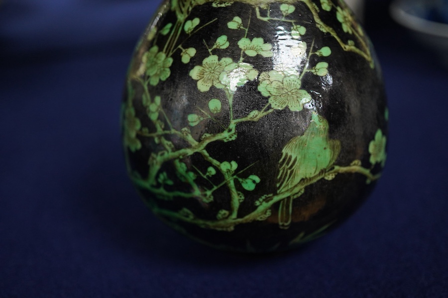 A Chinese famille noire bottle vase, 17cm high
